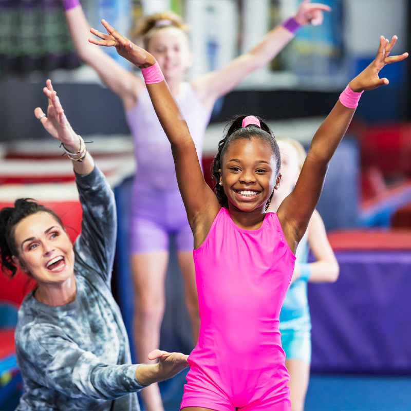 children play a game of youth volleyball