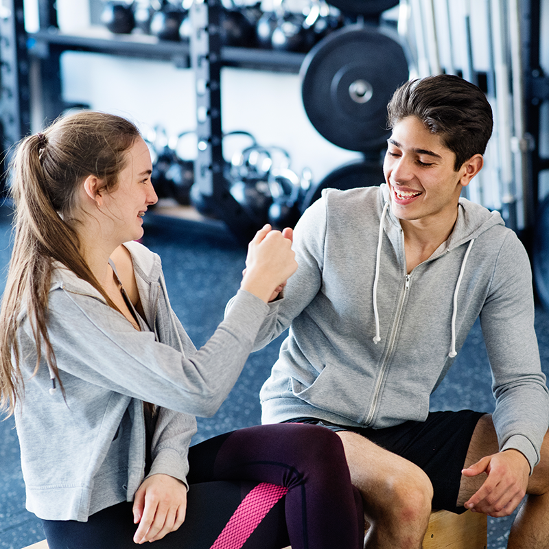 Teen & Young Adults people dance enthusiastically in a fitness class