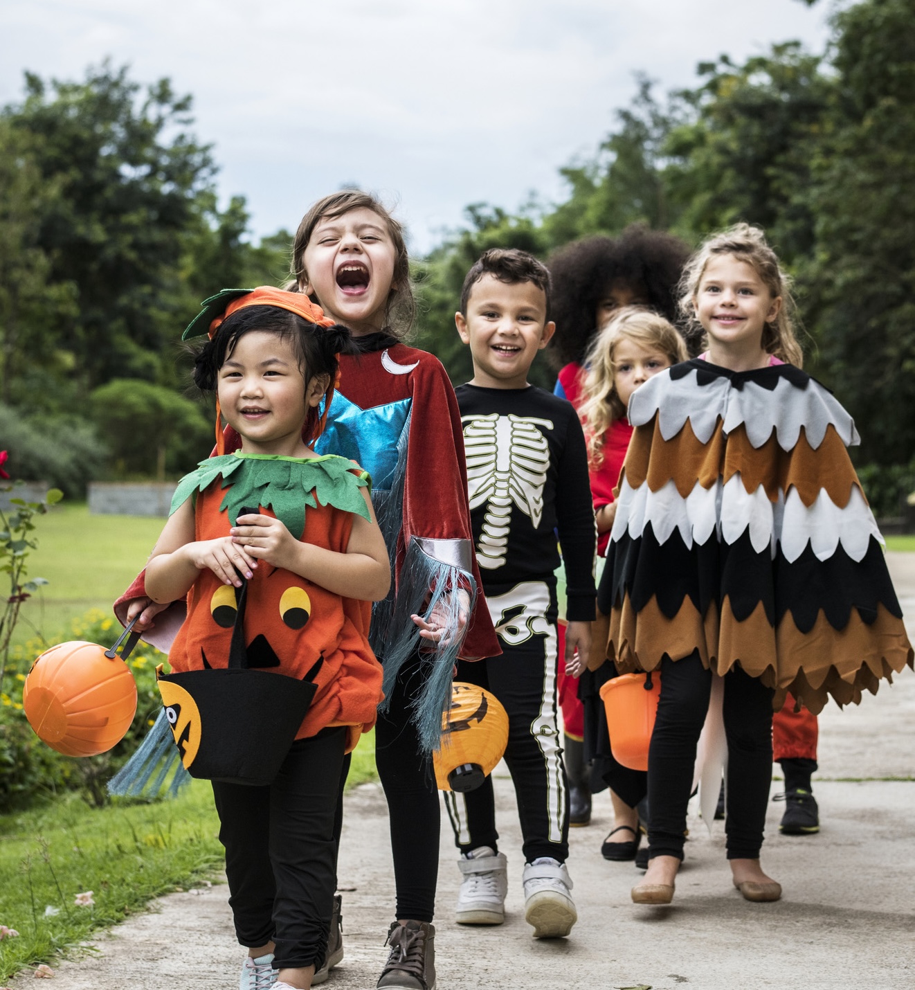 Young kids trick or treating during Halloween