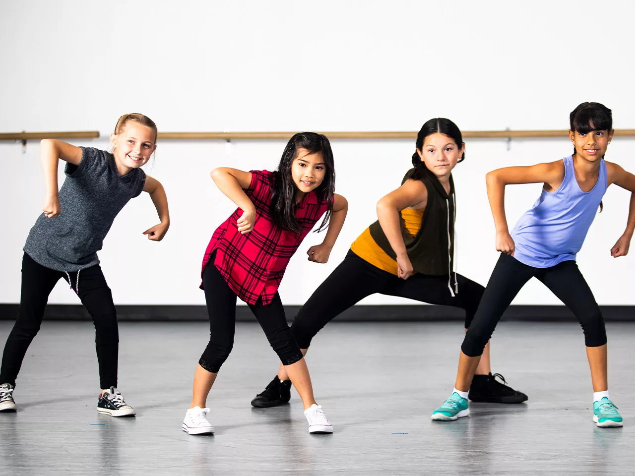 Children perform a dance in a hiphop style